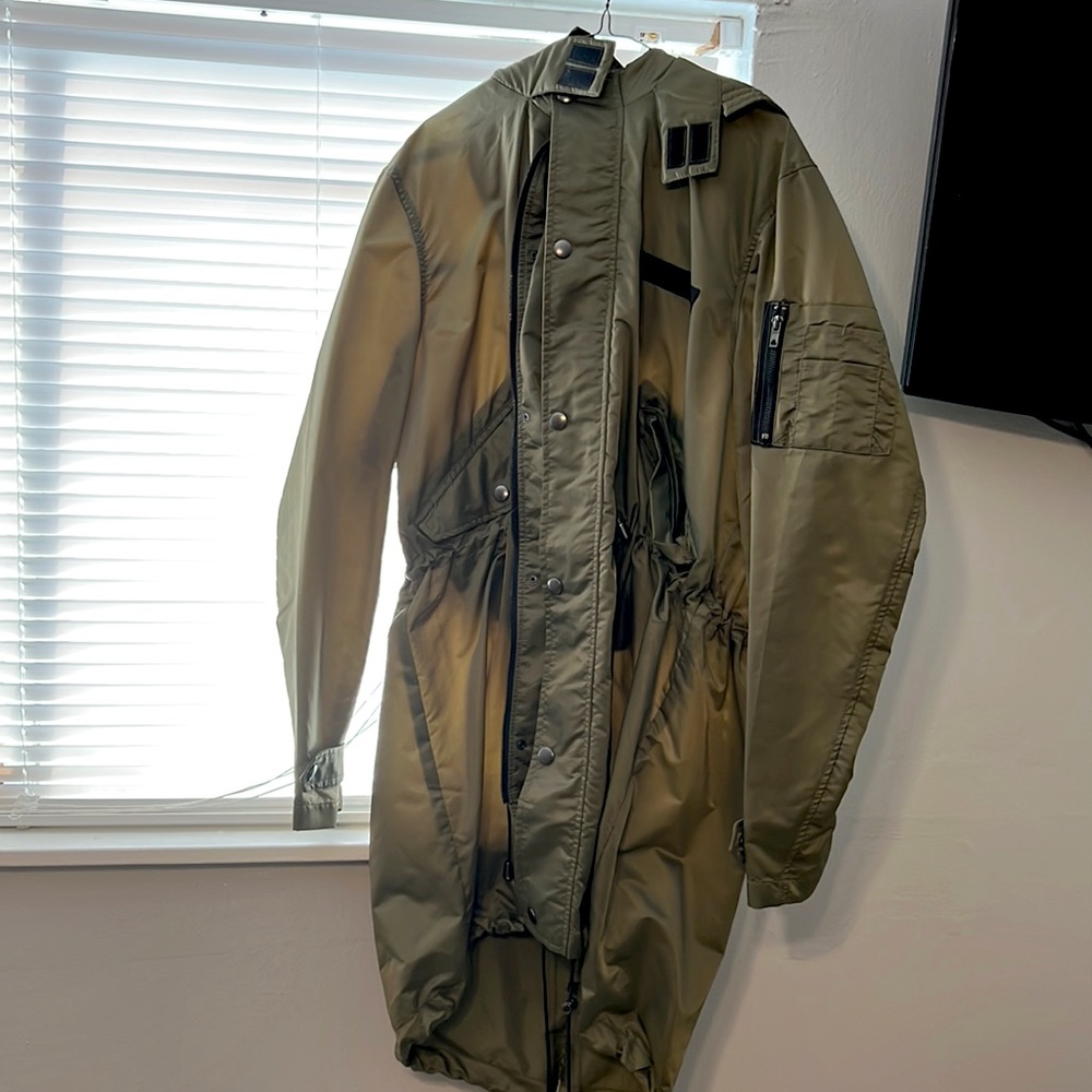 Long peacoat wind breaker. Negotiating.
